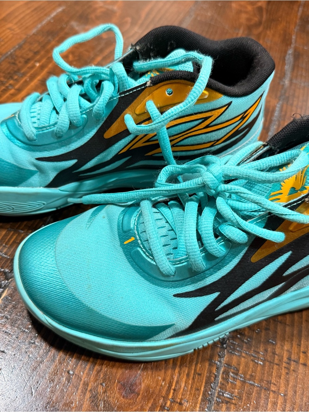 Puma Kids Teal Lace-Up Sneakers with Gold Accents